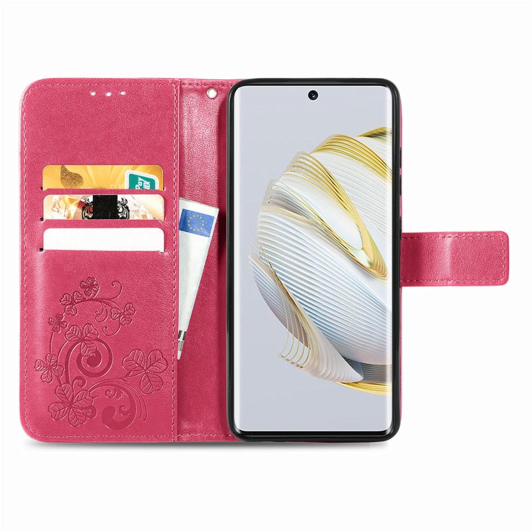 Rose leather phone case with embossed floral design, card holder slots, and clasp strap