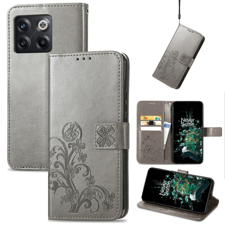Silver gray leather flip phone case with embossed floral four-leaf clasp and buckle closure