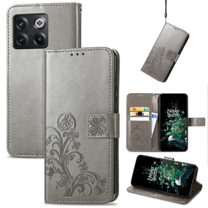 Silver gray leather flip phone case with embossed floral four-leaf clasp and buckle closure