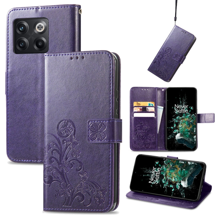 Dark purple leather flip phone case with embossed floral four-leaf clasp and buckle closure