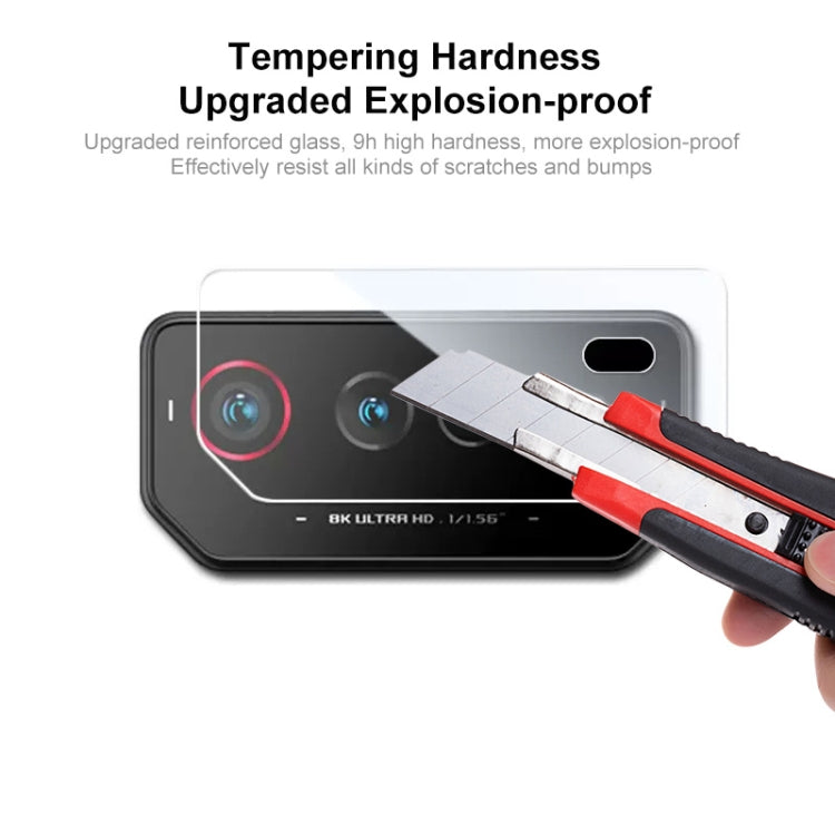 Rear camera lens tempered glass film installation with edge scraper tool