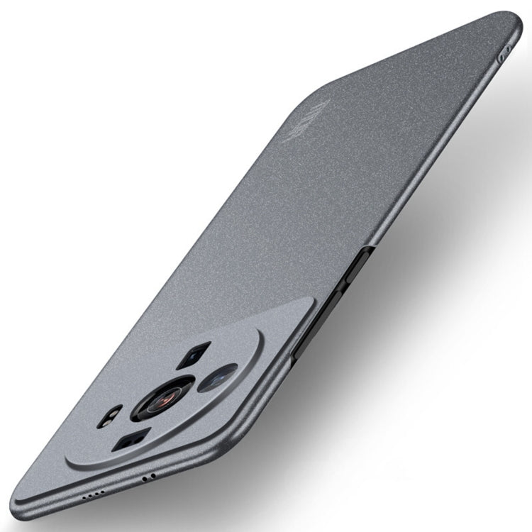 Frosted dark gray ultra-thin phone case with smile graphic and side button openings