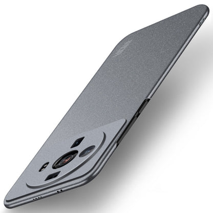 Frosted dark gray ultra-thin phone case with smile graphic and side button openings