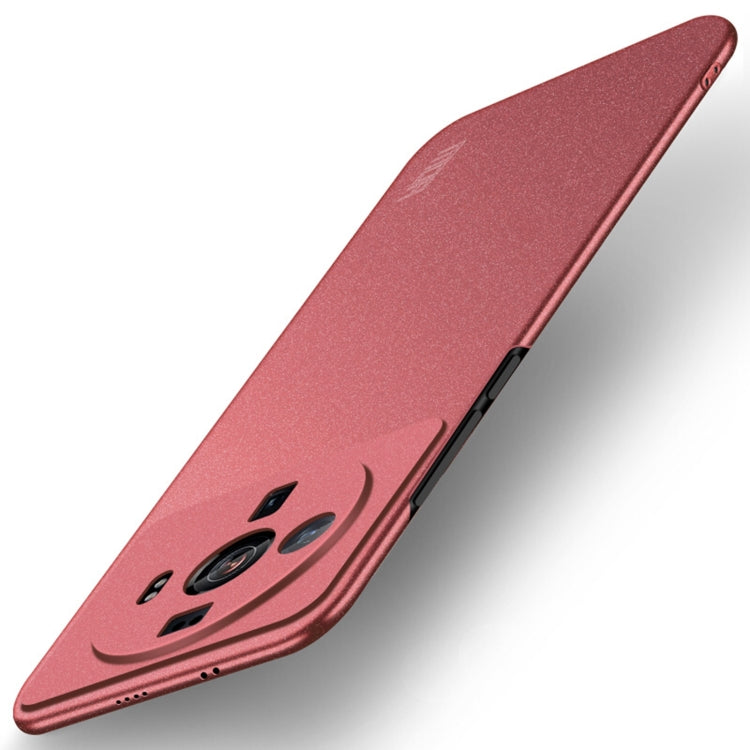 Frosted red ultra-thin phone case with smile graphic and rear camera cutout