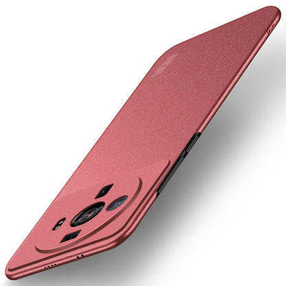 Frosted red ultra-thin phone case with smile graphic and rear camera cutout
