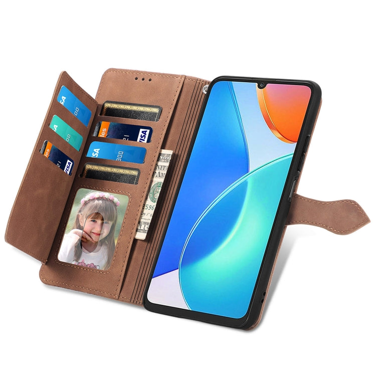 Brown leather wallet phone case with card slots, window photo holder, and zipper