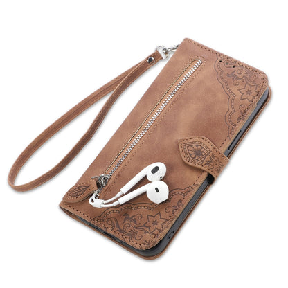 Brown embossed flower leather phone wallet case with zipper, wrist strap, and earbud holder