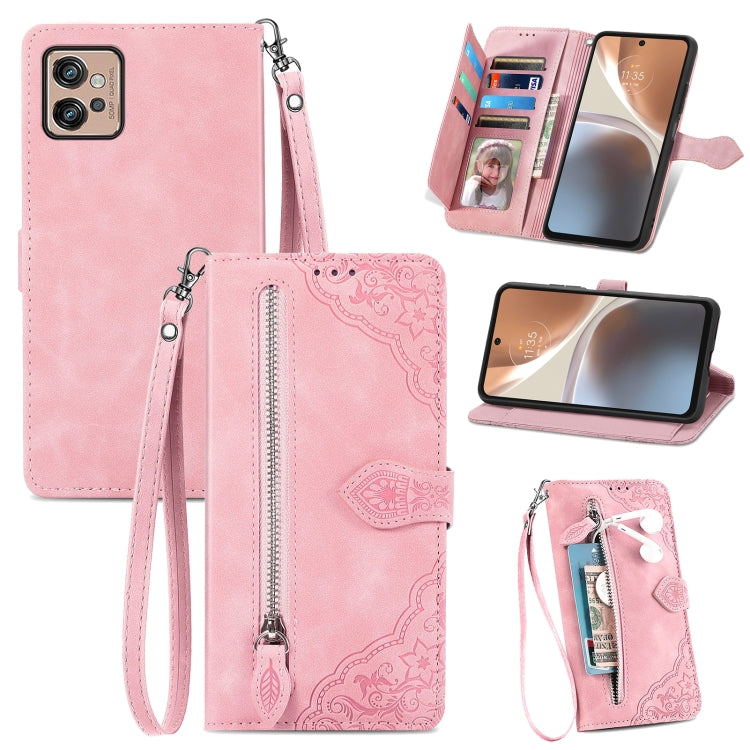 Rose pink embossed flower leather phone wallet case with zipper, card slots, and wrist strap