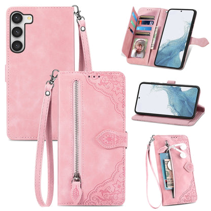 Pink embossed flower zipper leather phone case with wrist strap and card slots