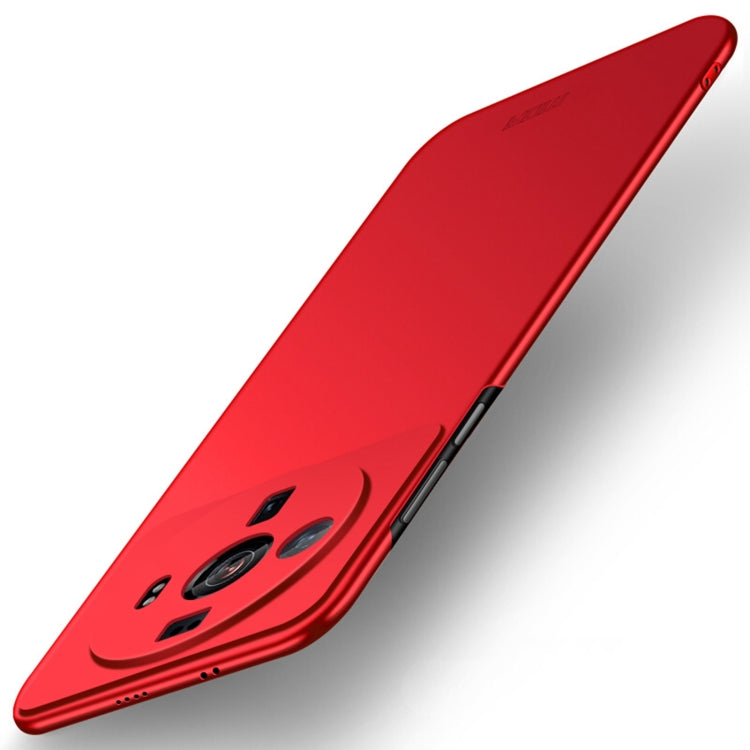 Red ultra-thin hard phone case showing camera lens openings along the back