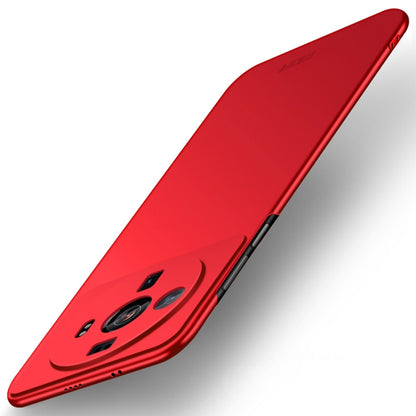Red ultra-thin hard phone case showing camera lens openings along the back