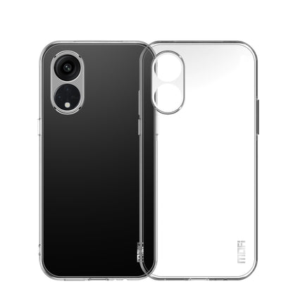 Clear TPU phone case on black phone back with dual camera cutout