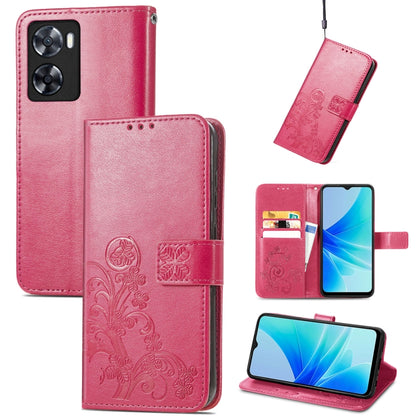 Magenta embossed leather folio phone case with buckle clasp, card slots, and cutout camera.