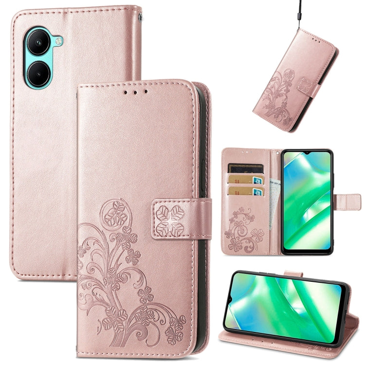 Light pink embossed leather phone case with four-leaf clasp, card slots, and kickstand.