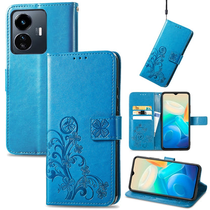 Blue folio leather phone case with embossed floral four-leaf clasp and card slots