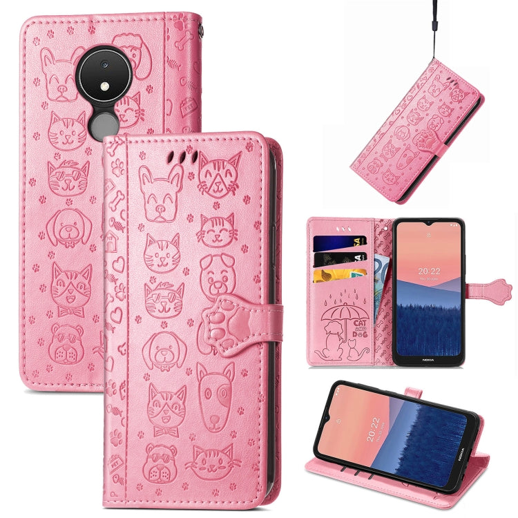 Embossed leather phone wallet case in pink with cat and dog icons, flip cover