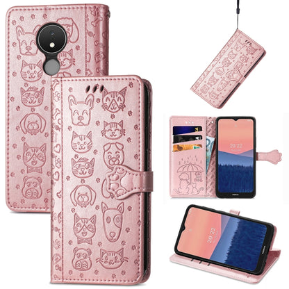 Embossed leather phone wallet case in blush pink with cat and dog icons, flip cover