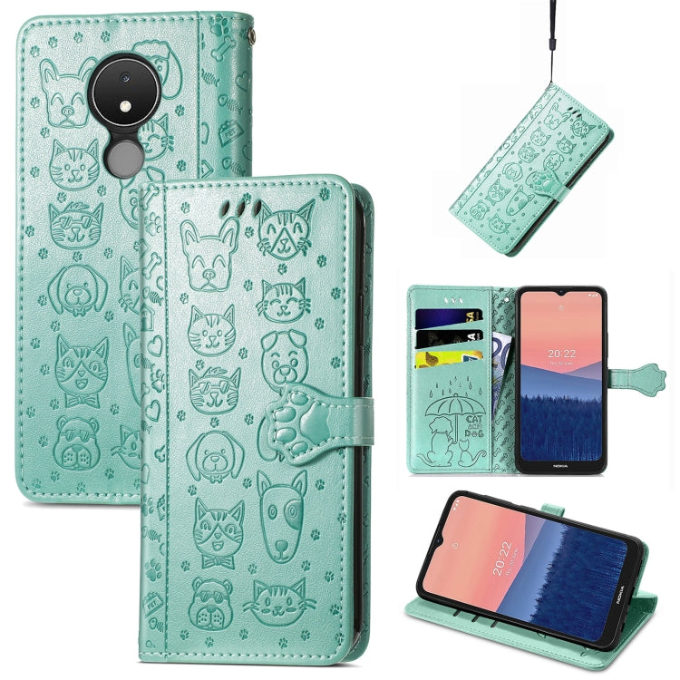 Embossed leather phone wallet case in teal with cat and dog icons, flip cover