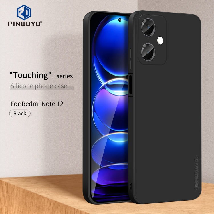 Black silicone TPU phone case with camera cutouts, shown beside a phone display.