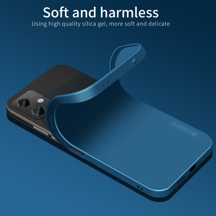 Blue silicone TPU phone case with raised edges and cutouts for cameras and ports.