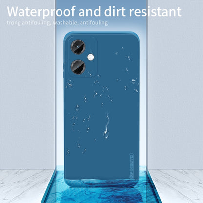 Blue silicone TPU phone case with water droplets on the back surface.