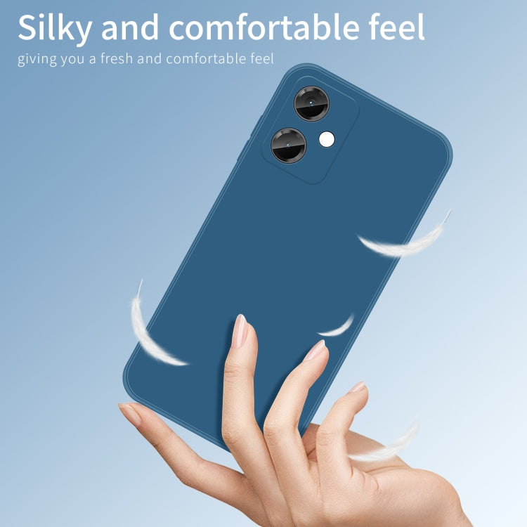 Blue silicone TPU phone case held in hand, showing camera cutouts and buttons.