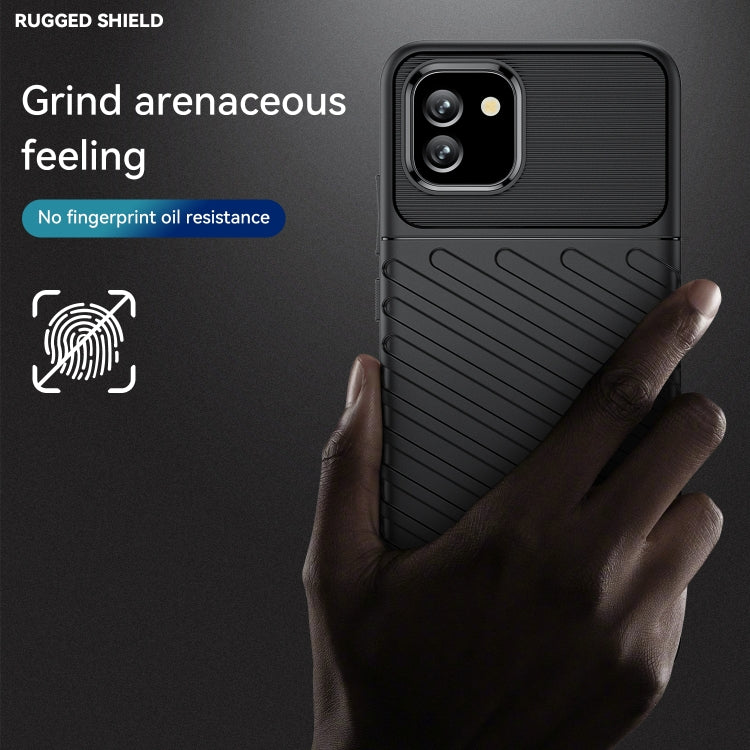 Black rugged shockproof TPU phone case with textured back, shown with a hand hold