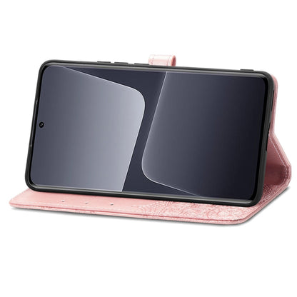 Rose embossed leather phone folio case with mandala pattern, shown folded as a stand