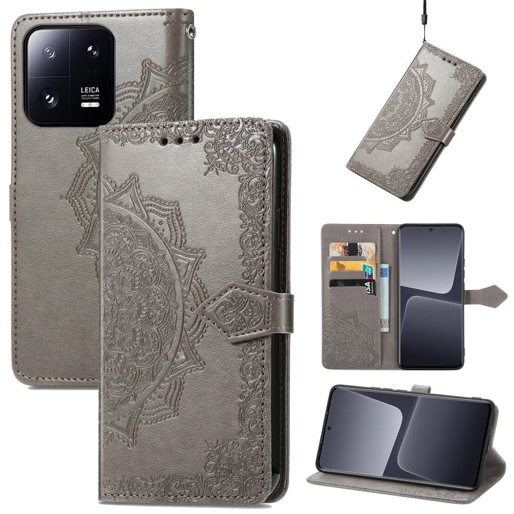 Gray embossed leather folio phone case with mandala flower pattern, card slots, and strap