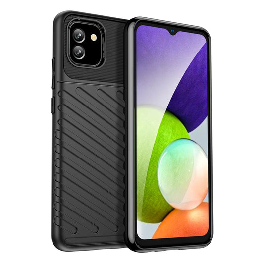Black shockproof TPU phone case with rugged grip texture, raised camera cutout