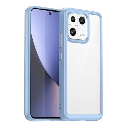 Phone case with clear back and light blue TPU edges, camera cutout and raised rim