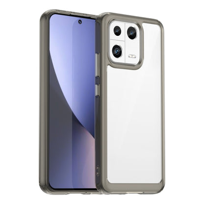 Phone case with clear back and smoke gray TPU edges, camera cutout and raised rim