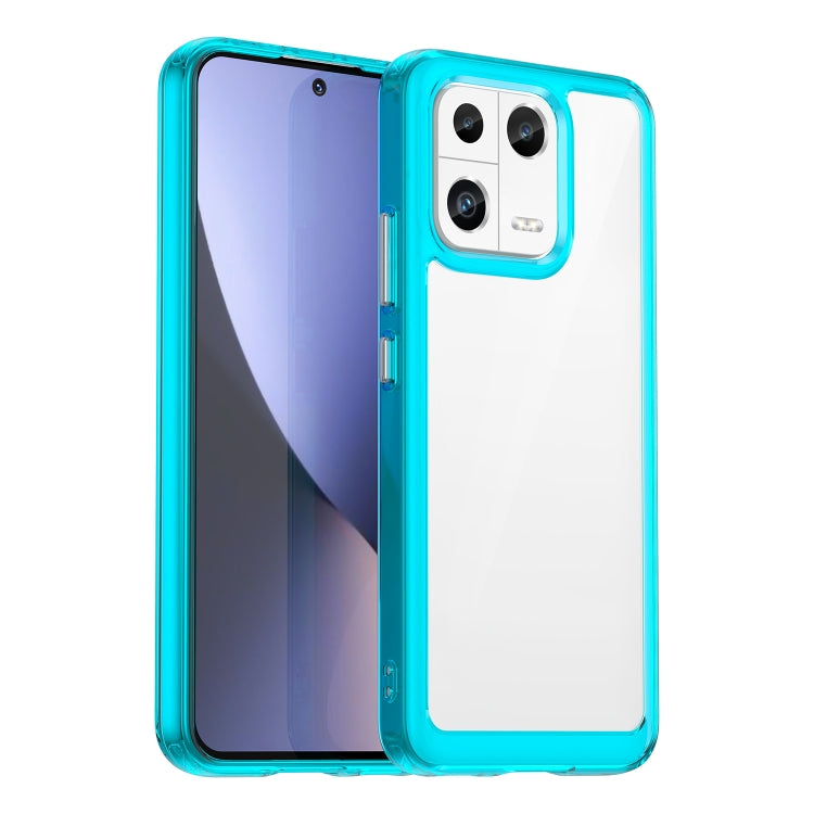 Phone case with clear back and teal TPU edges, camera cutout and raised rim