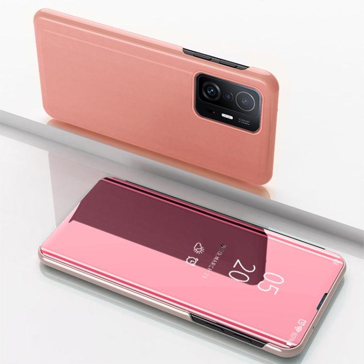 Pink horizontal flip leather-style phone case with mirror, phone holder, camera cutout