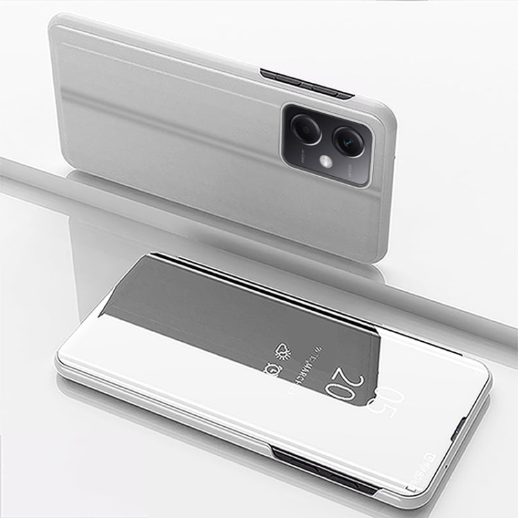 Silver mirror flip leather phone case with holder; camera cutouts visible