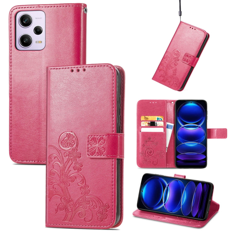 Magenta leather phone case, embossed four-leaf clasp and floral pattern, flip folio wallet.