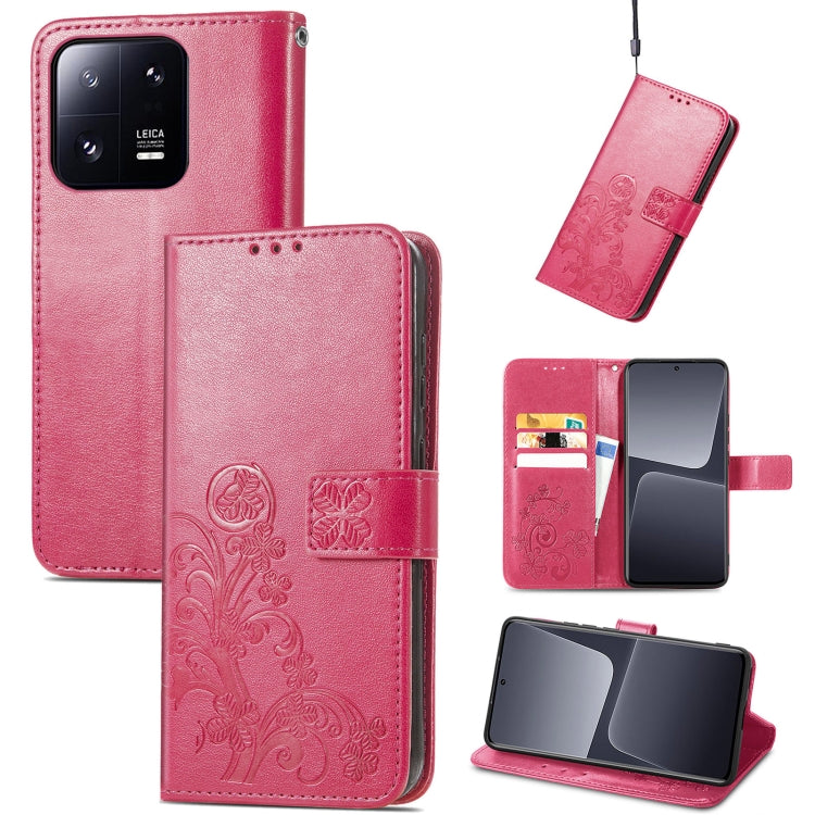 Pink embossed leather phone case with four-leaf clasp buckle and card slots