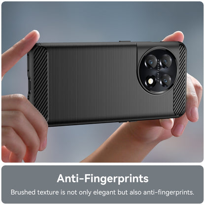 Brushed texture TPU phone case held by hands, black; camera cutout visible