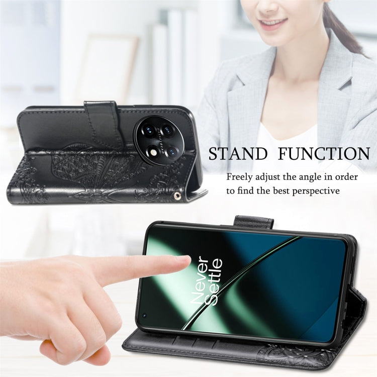 Black faux-leather flip phone case with embossed butterfly, stand function, card slots
