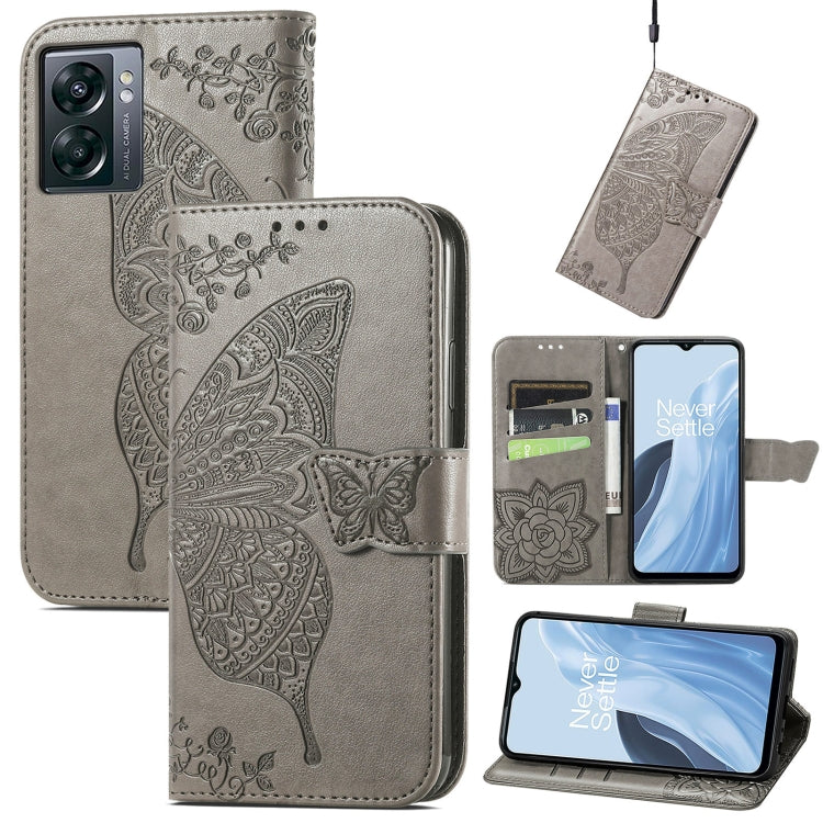 Gray faux-leather flip phone case with embossed butterfly and floral motif, card slots