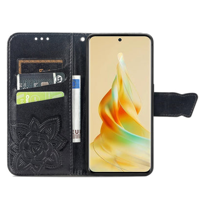 Black flip leather phone case with embossed butterfly and flower, open view