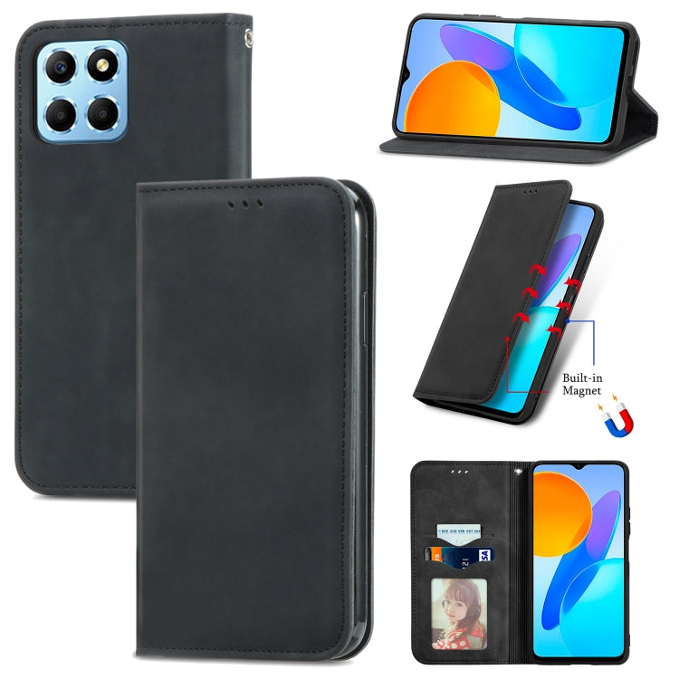 Black magnetic flip leather phone case with camera cutout and speaker opening.