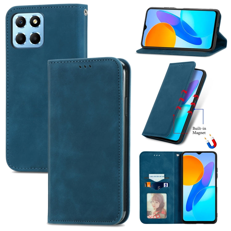 Blue magnetic flip leather phone case with camera cutout and speaker opening.