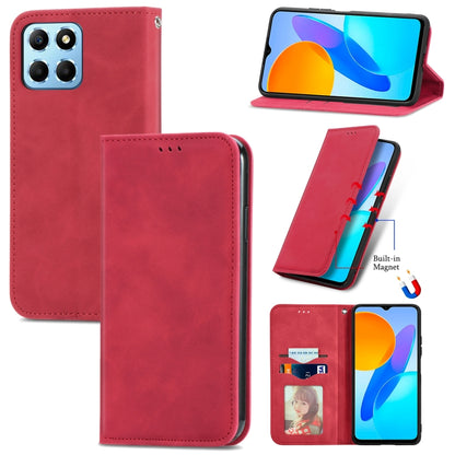 Red magnetic flip leather phone case with camera cutout and speaker opening.