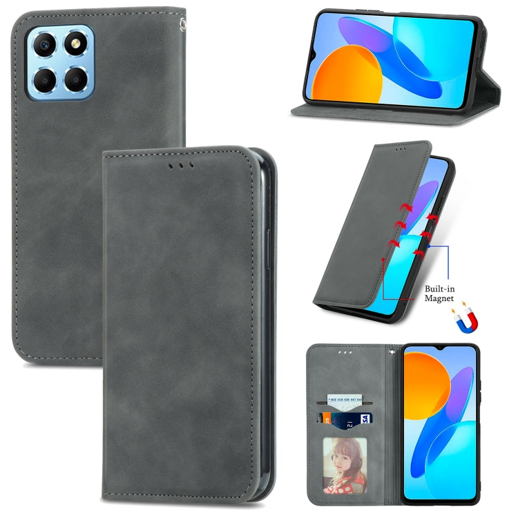 Magnetic flip phone case with faux leather finish, dark gray, card slot, built-in magnet.