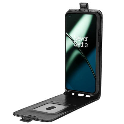 Black textured leather vertical flip phone case with open front showing card slot