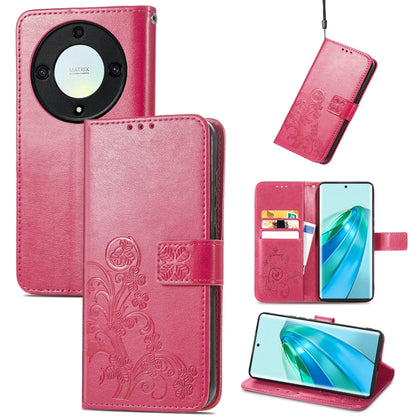 Magenta leather phone case with embossed floral design and four-leaf clasp buckle