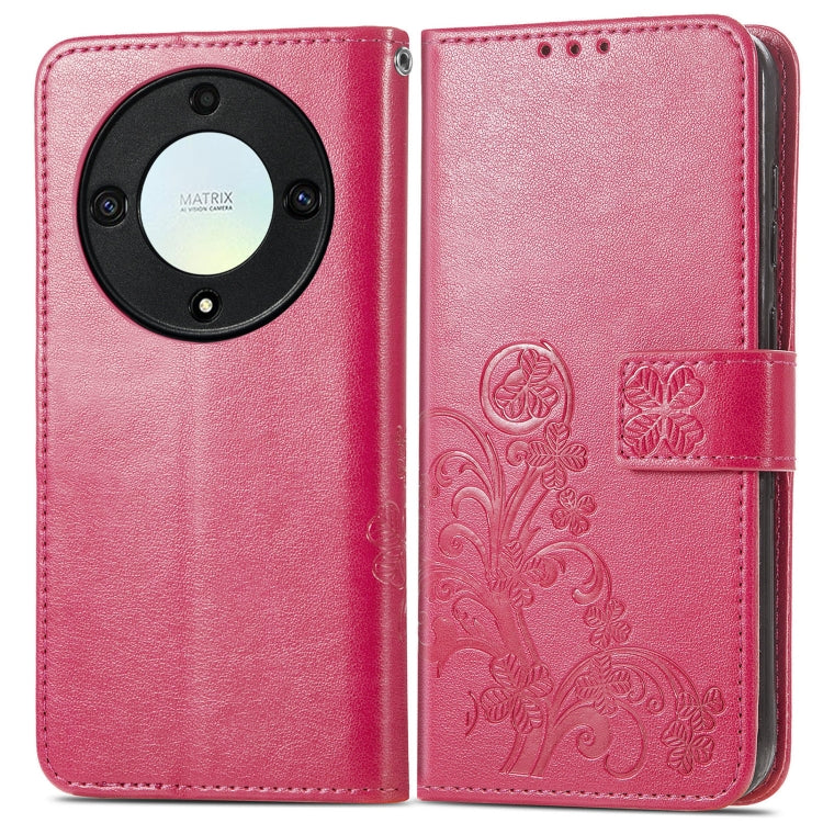 Pink leather phone case with embossed floral motif and four-leaf clasp buckle strap