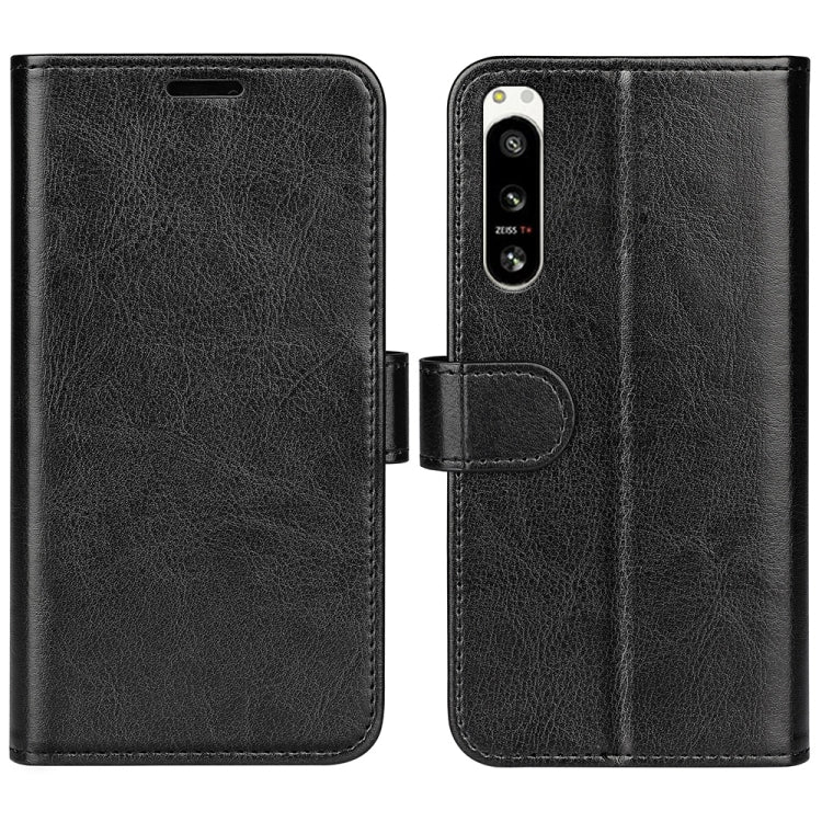 Black textured horizontal flip leather phone case with cutouts for ports and camera