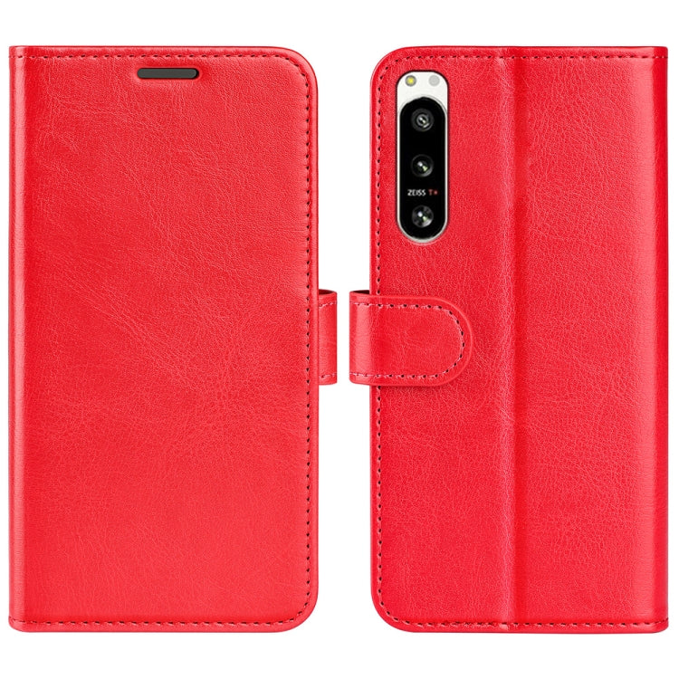 Red textured horizontal flip leather phone case with camera cutout and strap